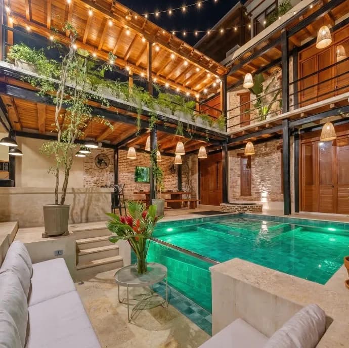 Private villa in Cartagena with an illuminated pool in a colonial courtyard